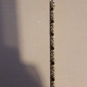 Blue and white bracelet in silver tone